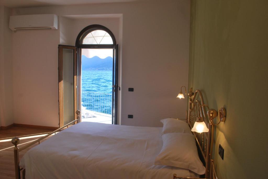 Villa Belvedere Como Lake Relais アルジェーニョ エクステリア 写真